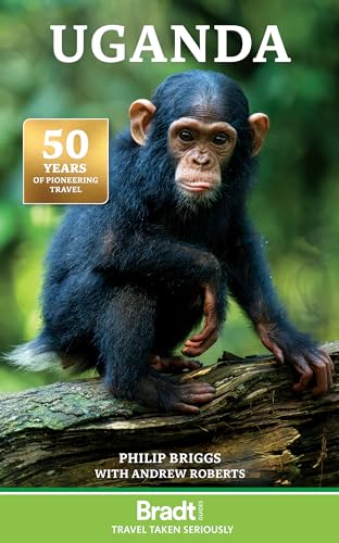 Book cover featuring a chimpanzee perched on a log against a blurred green background.