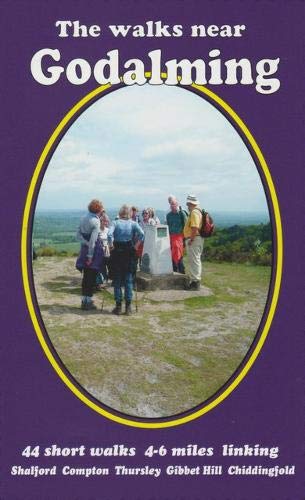 Book cover with a photo of hikers overlooking a hilly landscape.