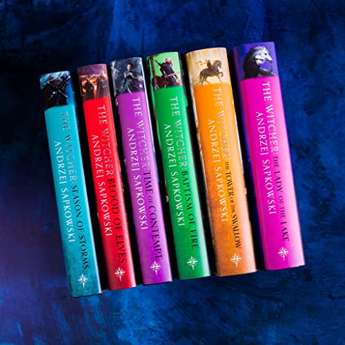 Seven colorful books from “The Witcher” series by Andrzej Sapkowski.