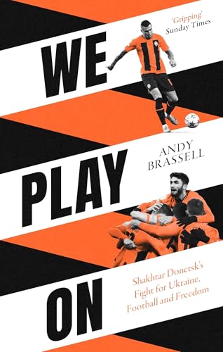 Book cover: "We Play On" with soccer players and bold orange design.