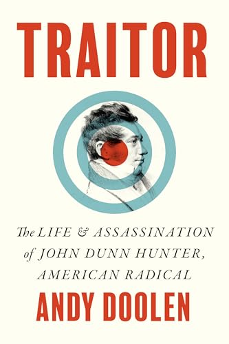 Book cover: portrait of a man within a target, titled “Traitor.”