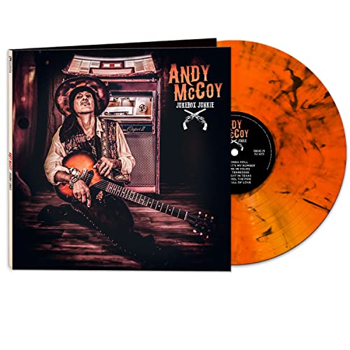 Andy McCoy album cover with a musician and a marbled orange and black vinyl record.