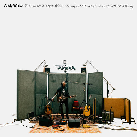 Album cover: Andy White in a recording studio with instruments.