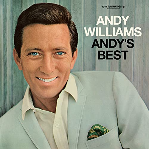 Andy Williams smiling in a light blue suit on the Andy's Best album cover.