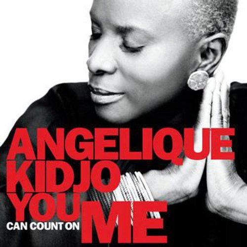 "Album cover featuring a black and white portrait of Angelique Kidjo with red and white text."