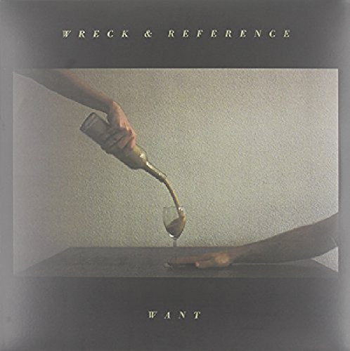 Album cover: hands pouring liquid into a glass, muted gold tones.