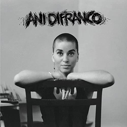 Black and white album cover featuring Ani DiFranco with short hair.