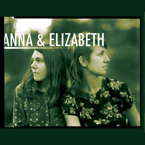 "CD cover with two people, man and woman, in dark floral shirts."