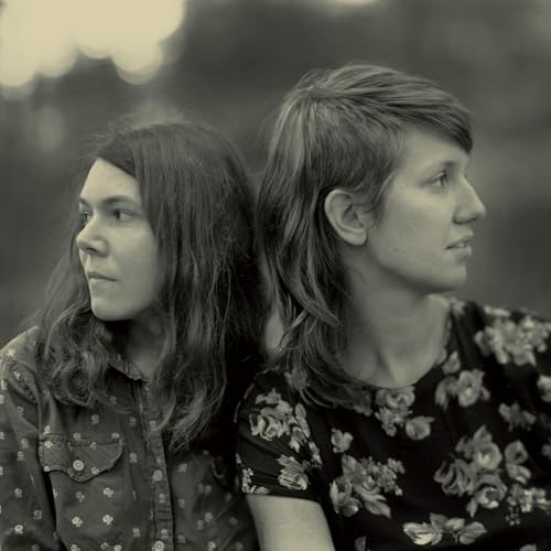 Two women, Anna & Elizabeth, facing left in a sepia-toned portrait.