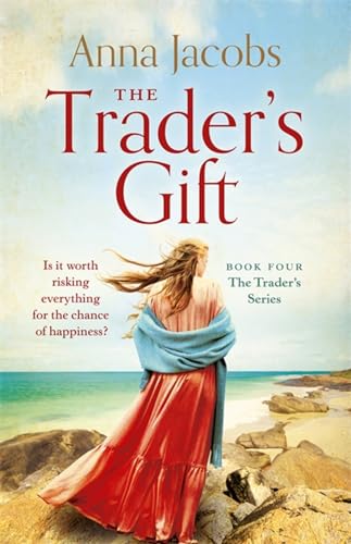 Book cover: woman on rocky beach, titled “The Trader’s Gift.”