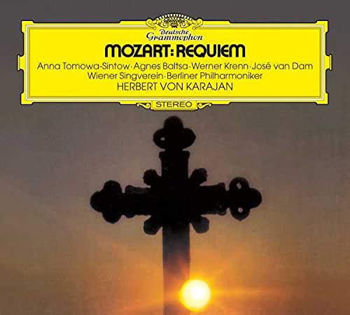 CD cover featuring a silhouette of a cross against a sunset with yellow text.