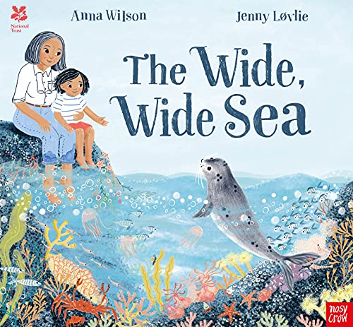 Children look at a seal swimming in a colorful underwater scene.