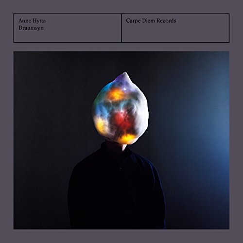 CD cover: person with a glowing, amorphous head shape.