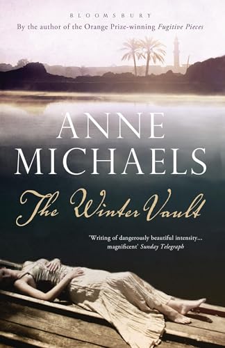 Book cover: “The Winter Vault” with a woman lying by water.