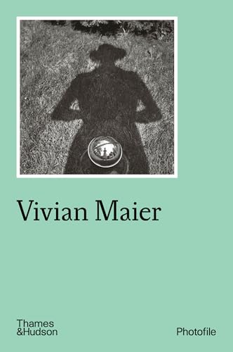 Book cover showing a black and white photograph of a person's shadow on grass.