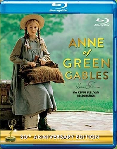 Blu-ray cover featuring a young girl in a straw hat holding a carpet bag.