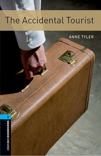 Book cover: "The Accidental Tourist" with a brown suitcase image.