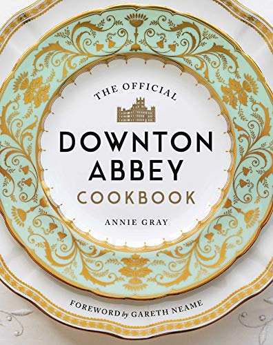 “The Official Downton Abbey Cookbook” cover with ornate teal and gold plate design.