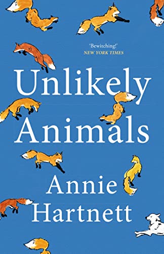 Book cover: "Unlikely Animals" by Annie Hartnett, with illustrated foxes.