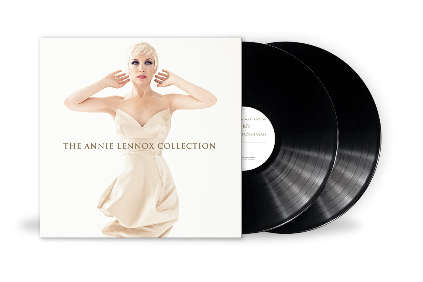 Annie Lennox album cover and two black vinyl records.