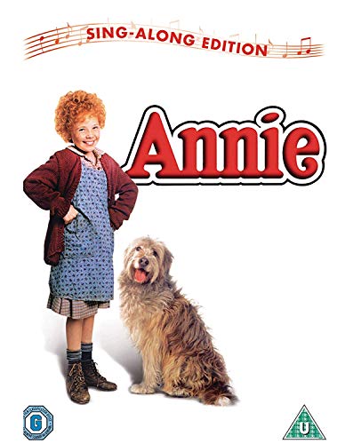 DVD cover for "Annie" featuring a young girl and a dog.