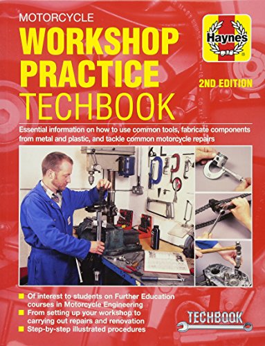 Red motorcycle repair techbook cover with mechanic working on a bike.