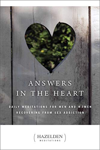 Book cover with a heart-shaped opening revealing green foliage.