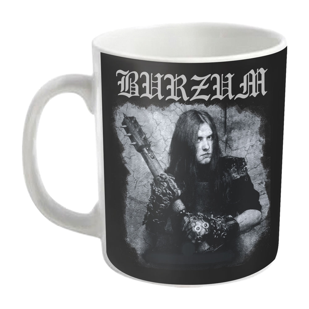 White mug with black design featuring a musician and guitar.
