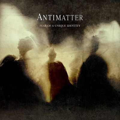Album cover for Antimatter’s “Fear Of A Unique Identity” featuring blurred figures.