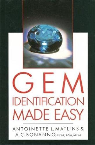 Book cover with a blue gem and red “GEM IDENTIFICATION” text.