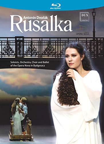 Blu-ray cover featuring a woman in white dress with long curly hair.