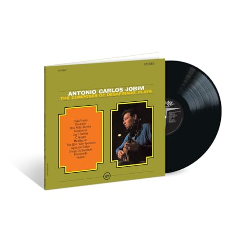 Antonio Carlos Jobim vinyl record with green cover and musician portrait.