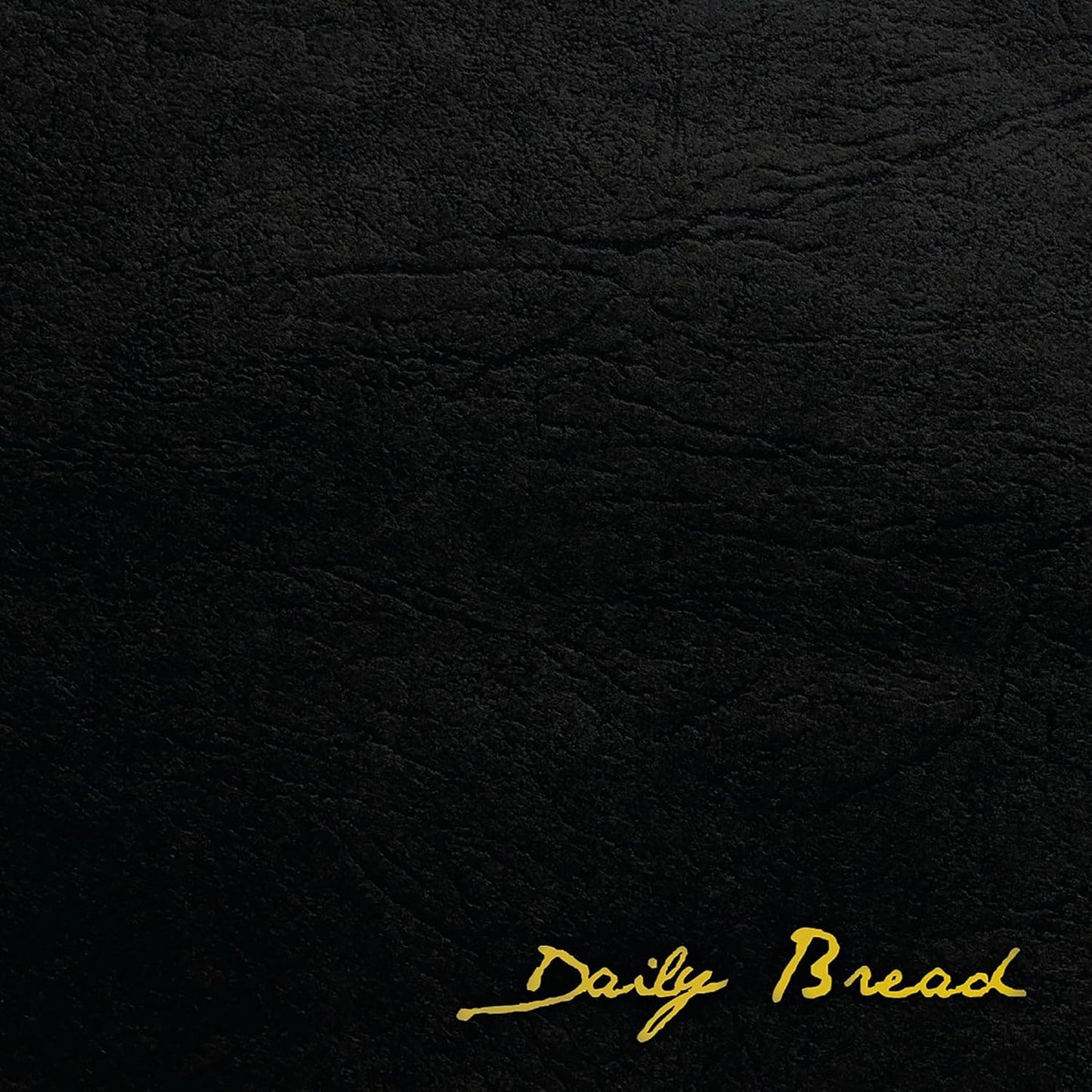 Black textured background with gold script reading "Daily Bread".