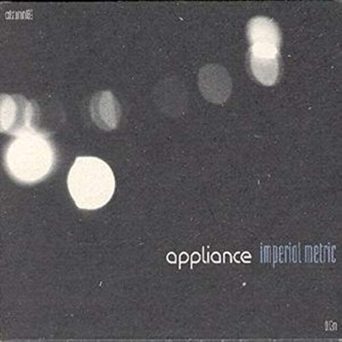 Black CD case with blurred lights and white text: "appliance imperial metric".