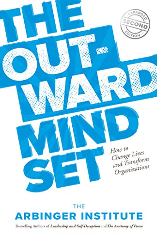 Book cover: “The Outward Mindset” in white and blue text.