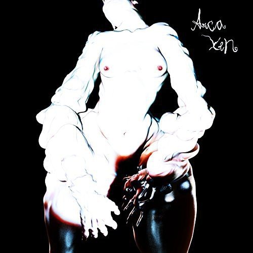Album cover for Arca’s Xen: a nude figure in dramatic lighting.