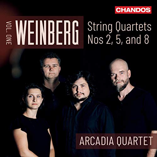 CD cover featuring four musicians in black against a dark background.