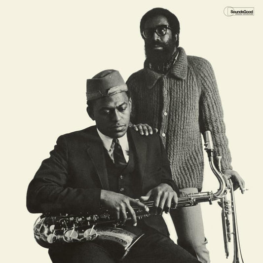 Black and white photo of two jazz musicians with saxophones.
