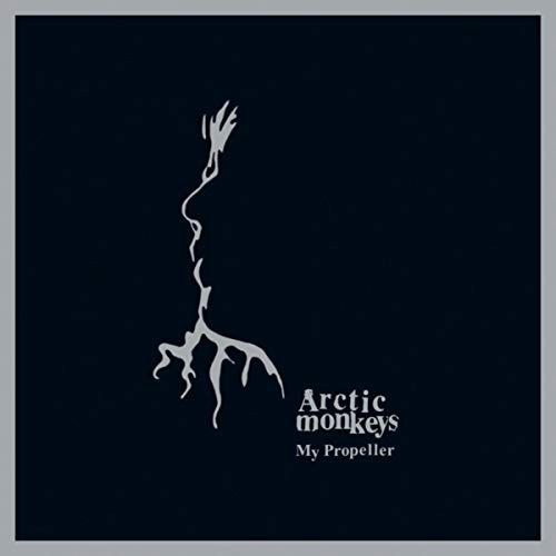 CD cover for Arctic Monkeys’ “My Propeller” with abstract silver design.