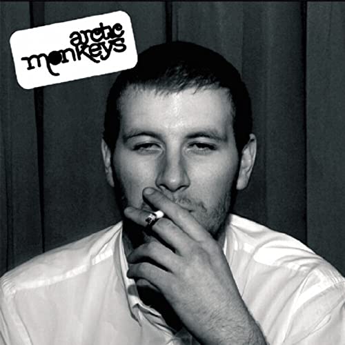 Black and white album cover featuring a man smoking with the Arctic Monkeys logo.