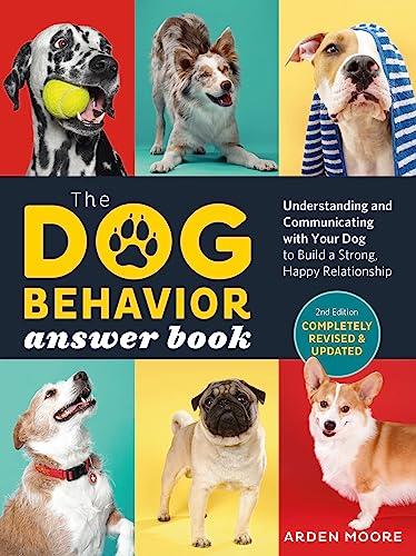 Book cover featuring six dogs, titled "The Dog Behavior Answer Book, 2nd Edition.