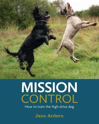 Book cover with two energetic dogs jumping in a grassy field.