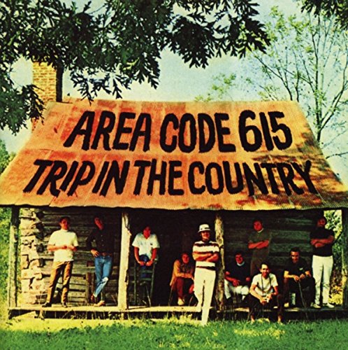 CD cover: rustic building with people, text “Area Code 615 Trip In The Country”.