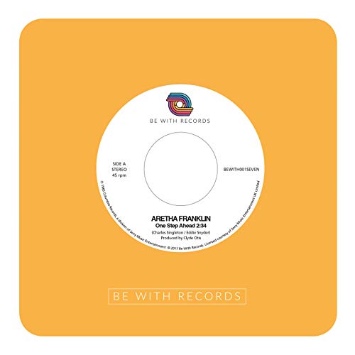 Yellow background with a white and colorful 45 rpm record label.