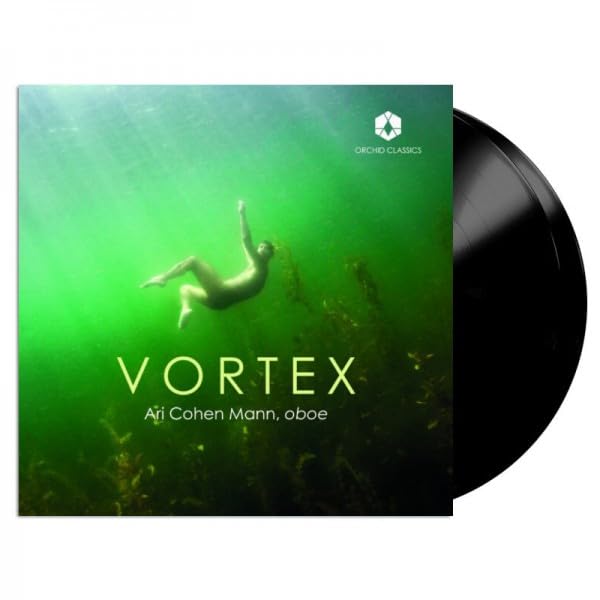 Vinyl record with cover art depicting a swimmer in green water.