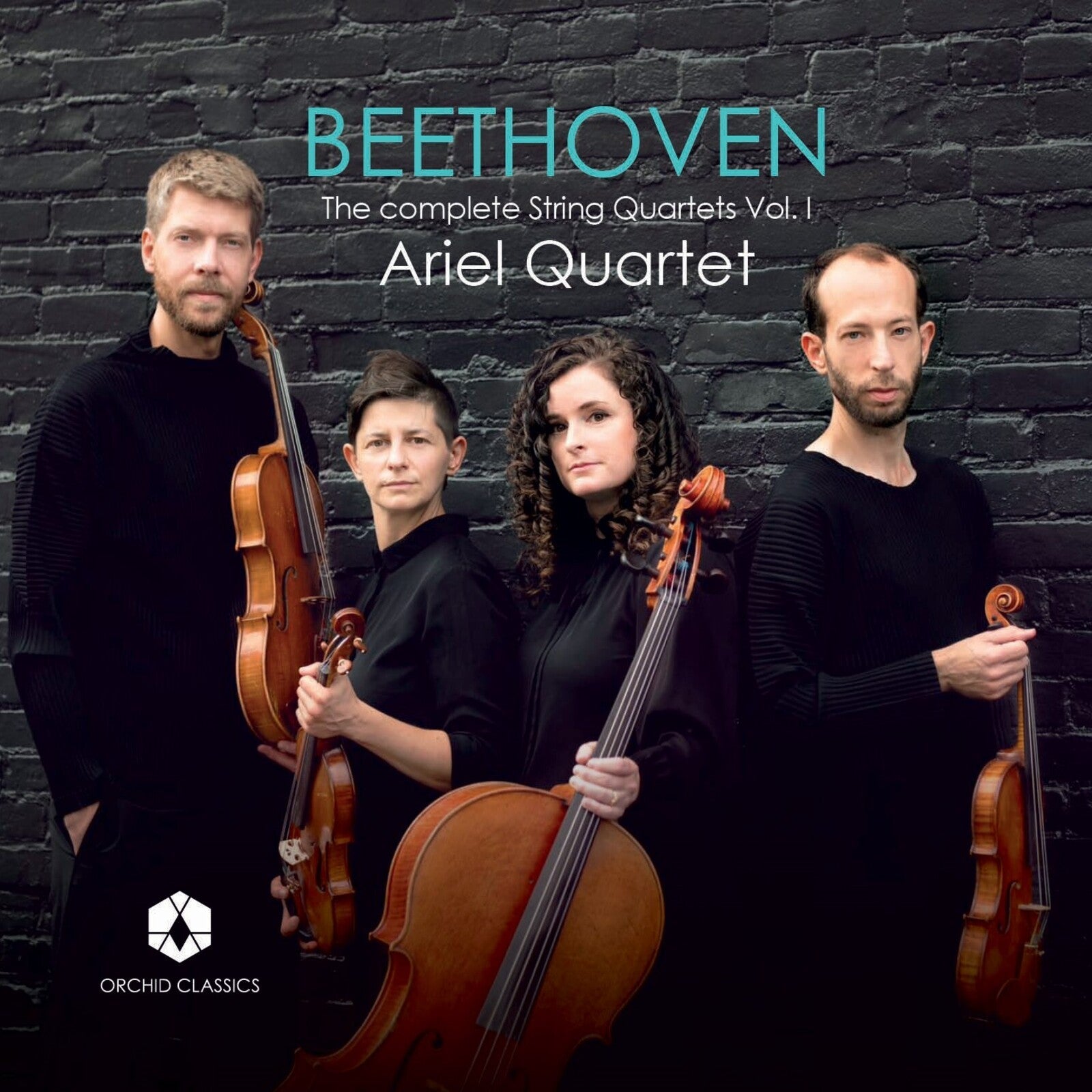 Ariel Quartet posing with string instruments against a dark brick wall.
