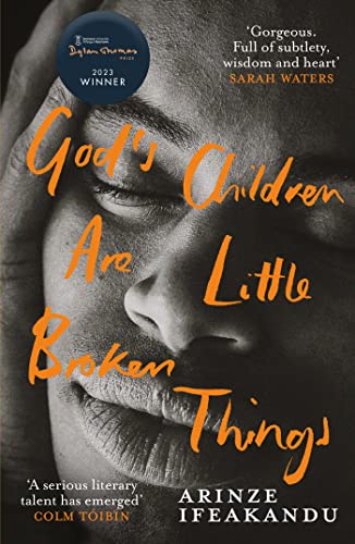 Book cover with close-up of a person’s face and orange title text.