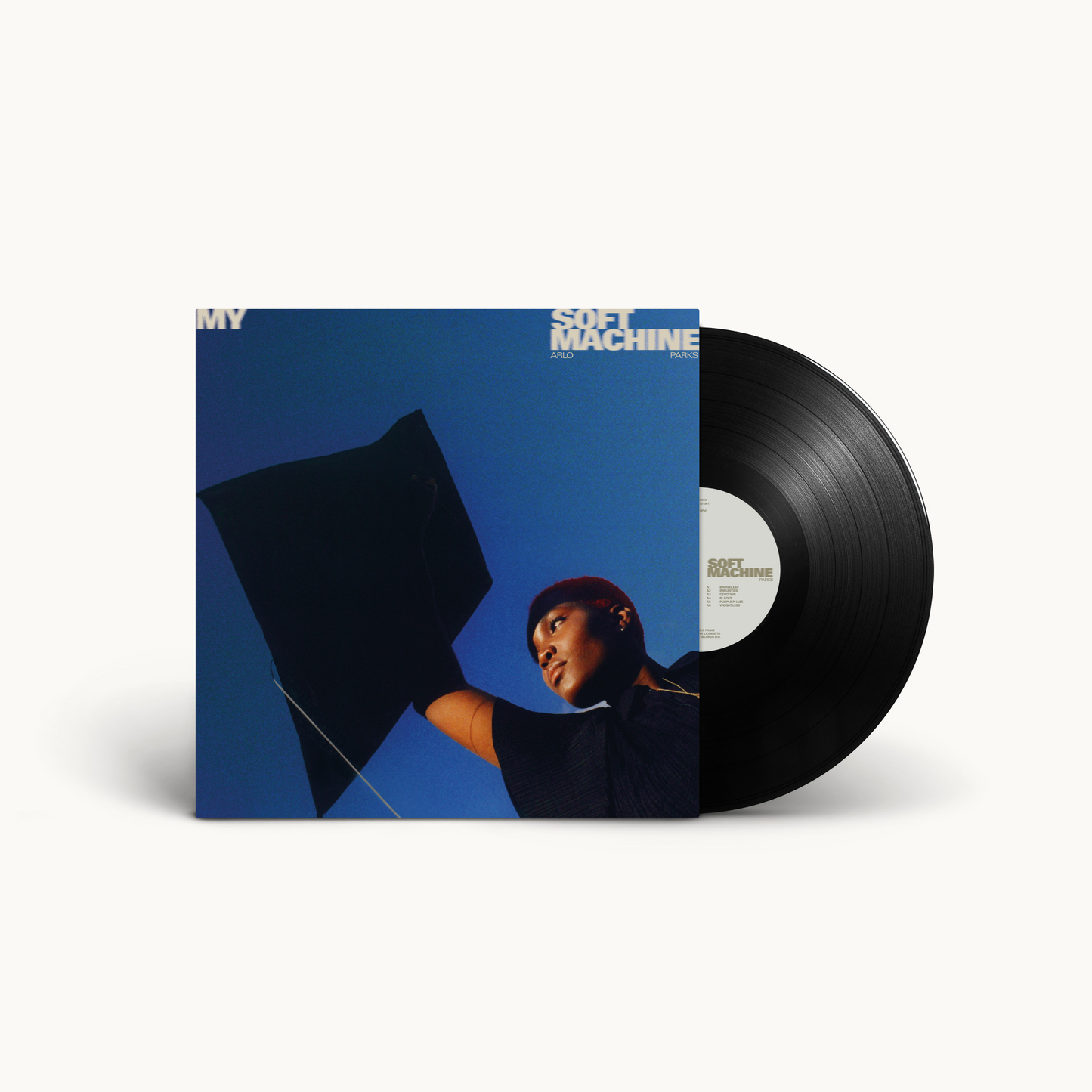 Arlo Parks' "My Soft Machine" vinyl record with blue cover art.
