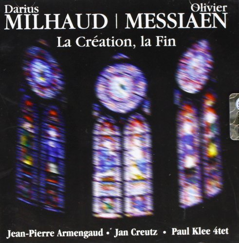 CD cover with blurred image of stained glass windows in dark tones.