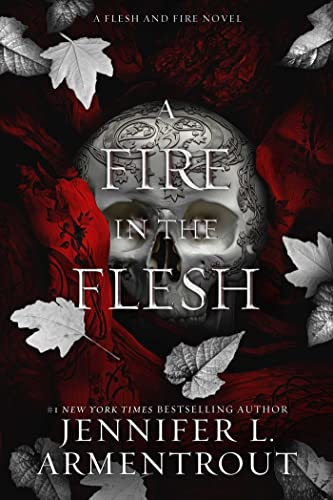 Book cover featuring a silver skull surrounded by red fabric and grey leaves.